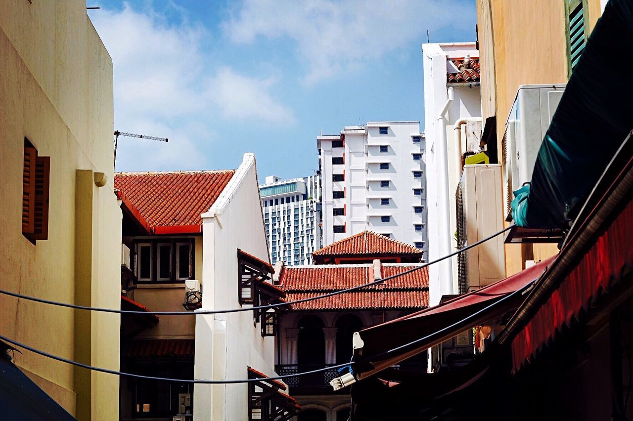 architecture, building exterior, built structure, low angle view, residential building, residential structure, city, sky, building, house, window, roof, residential district, day, modern, balcony, outdoors, no people, city life, cloud