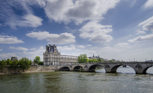 View of the louvre museum and pont des arts, paris , france