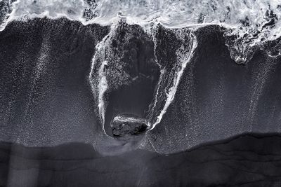 High angle view of rocks on beach