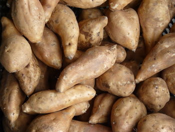 Full frame shot of sweet potato for sale in market