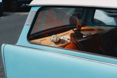 Close-up of car on side-view mirror