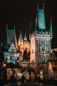 Buildings in city at night