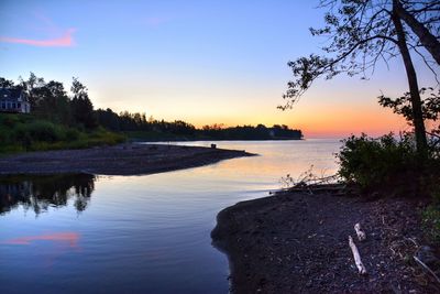 Scenic view of sea at sunset