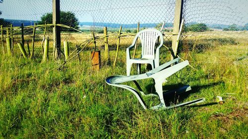 Fence on grassy field