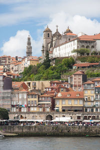 Buildings in city against sky