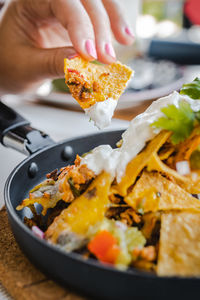 Close-up of hand holding food