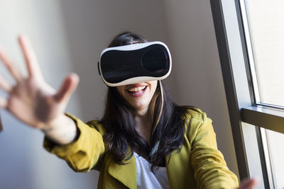 Happy woman wearing vr glasses