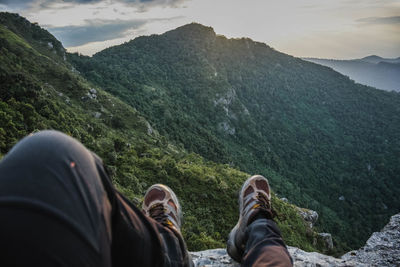 Low section of man at mountain