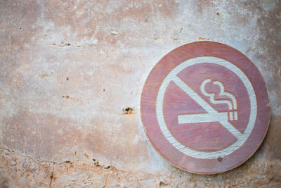 Close-up of sign on wall