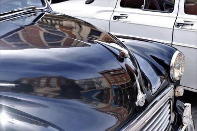 Close-up of vehicles on road