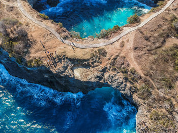 High angle view of rocks in water