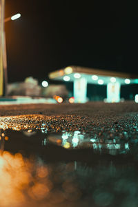 Surface level of illuminated street lights at night