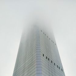 Low angle view of skyscraper against clear sky