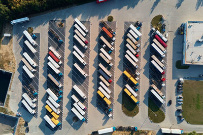 Top view parking lot with parked trucks