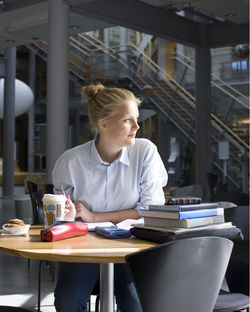 University student sitting in cafe