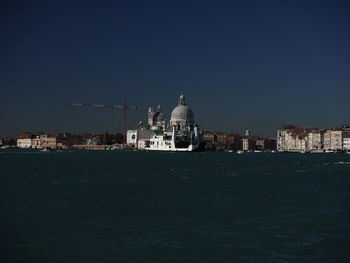 View of buildings in city at waterfront