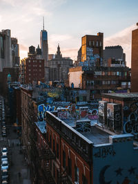 Cityscape against sky during sunset