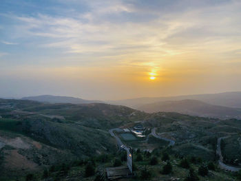 High angle view of landscape against sky during sunset