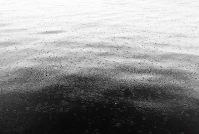 Full frame shot of wet sand on beach