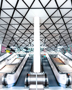 Low angle view of escalator at railroad station