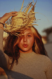 Close-up of young woman in basket