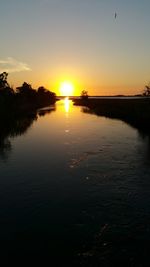Scenic view of sunset over sea
