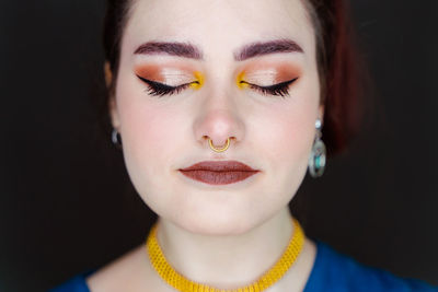 Close-up portrait of a young woman