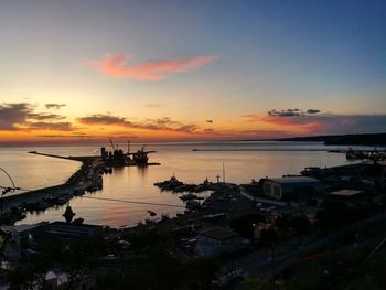 High angle view of sea against sky during sunset