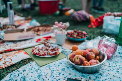 Close-up of fruits in bowl at market stall