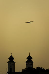 Low angle view of airplane flying in sky