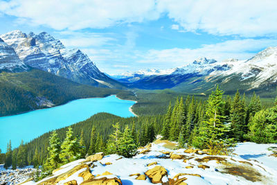 Scenic view of snowcapped mountain against cloudy sky