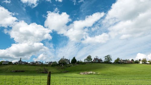 Scenic view of field against sky