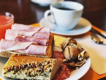 Close-up of breakfast served on table