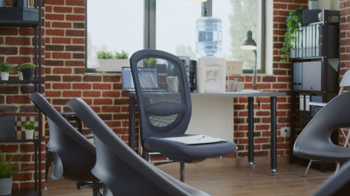 Low section of woman sitting on wheelchair