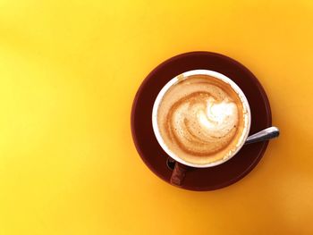 Close-up of coffee cup on table