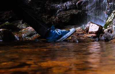 Reflection of rocks in water