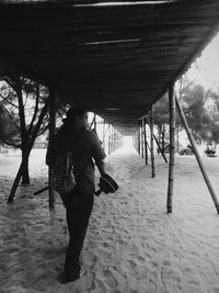 Rear view of man on beach