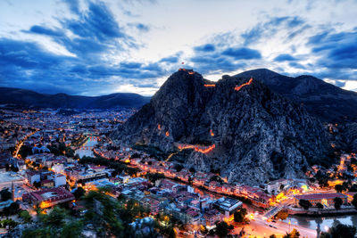 High angle view of bonfire on mountain against sky