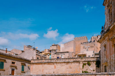 Architecture of scicli with sky with white clouds