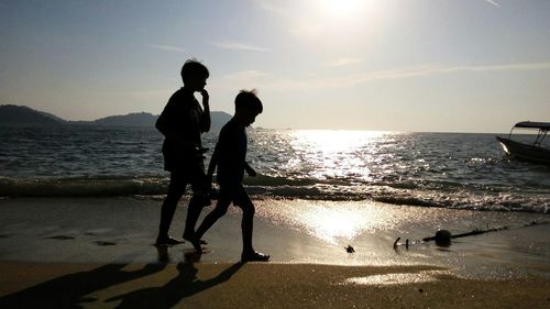 Scenic view of sea at sunset
