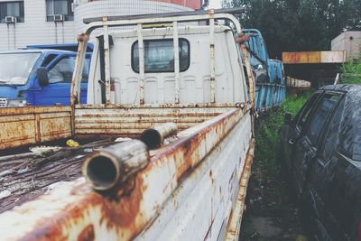 Close-up of rusty pick-up truck on street