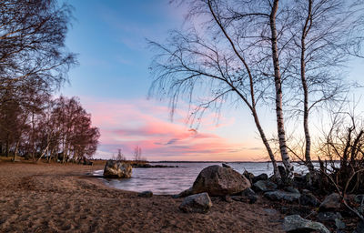 Scenic view of sea against sky at sunset