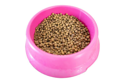 High angle view of strawberries in container against white background