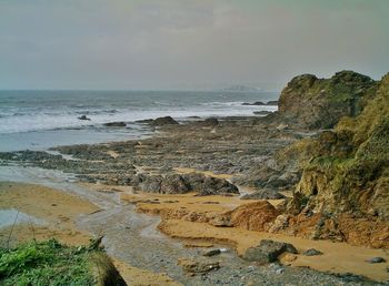 Scenic view of beach against sky