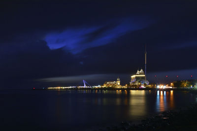 View of illuminated city at night