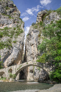 View of arch bridge over sea