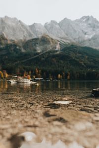 Surface level of lake against mountain range