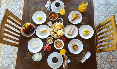 High angle view of food and drinks on table at home