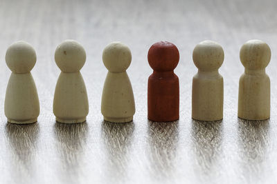 Close-up of chess pieces on table