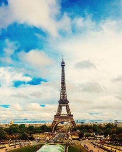 Silhouette of eiffel tower against cloudy sky